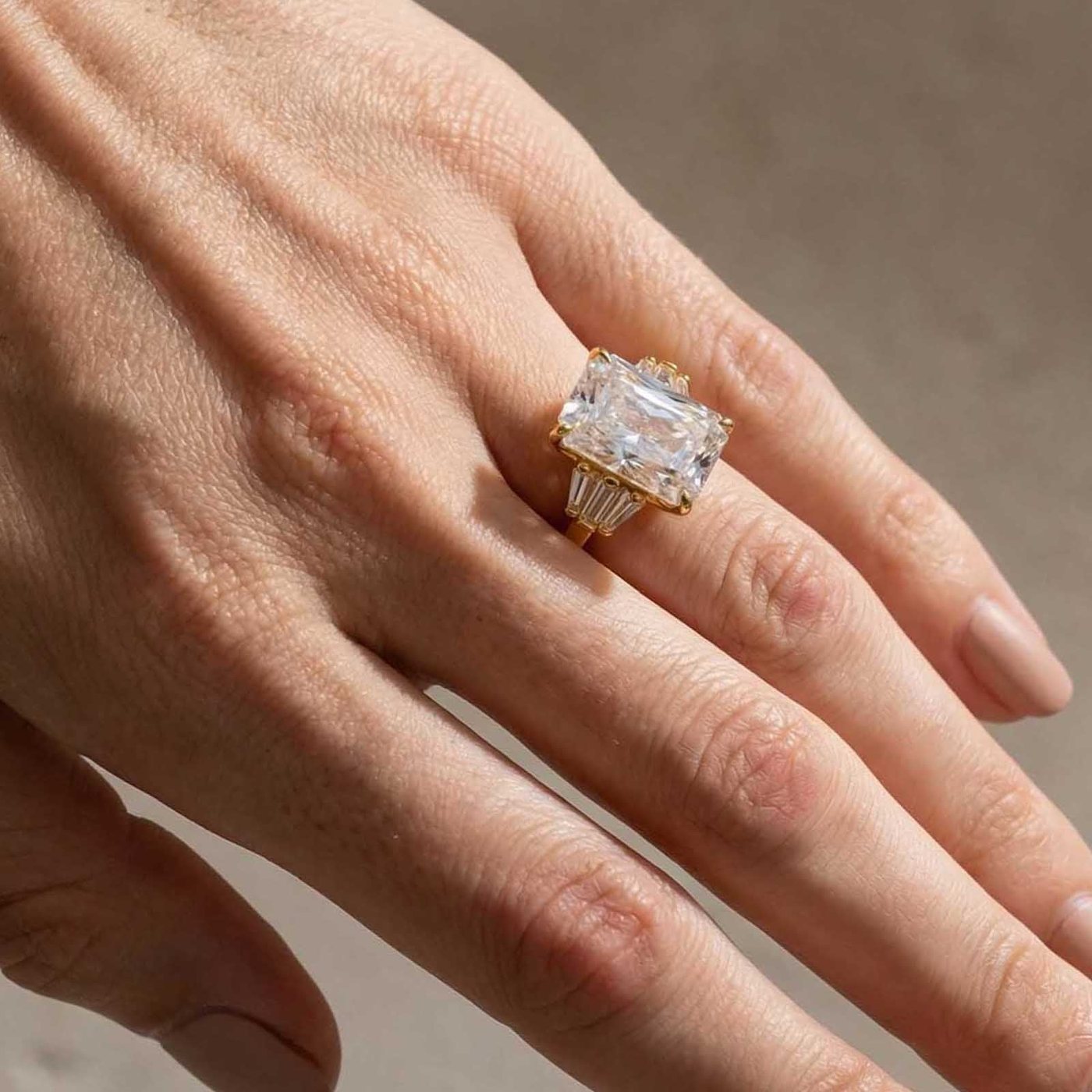 Solitaire ring worn on hand
