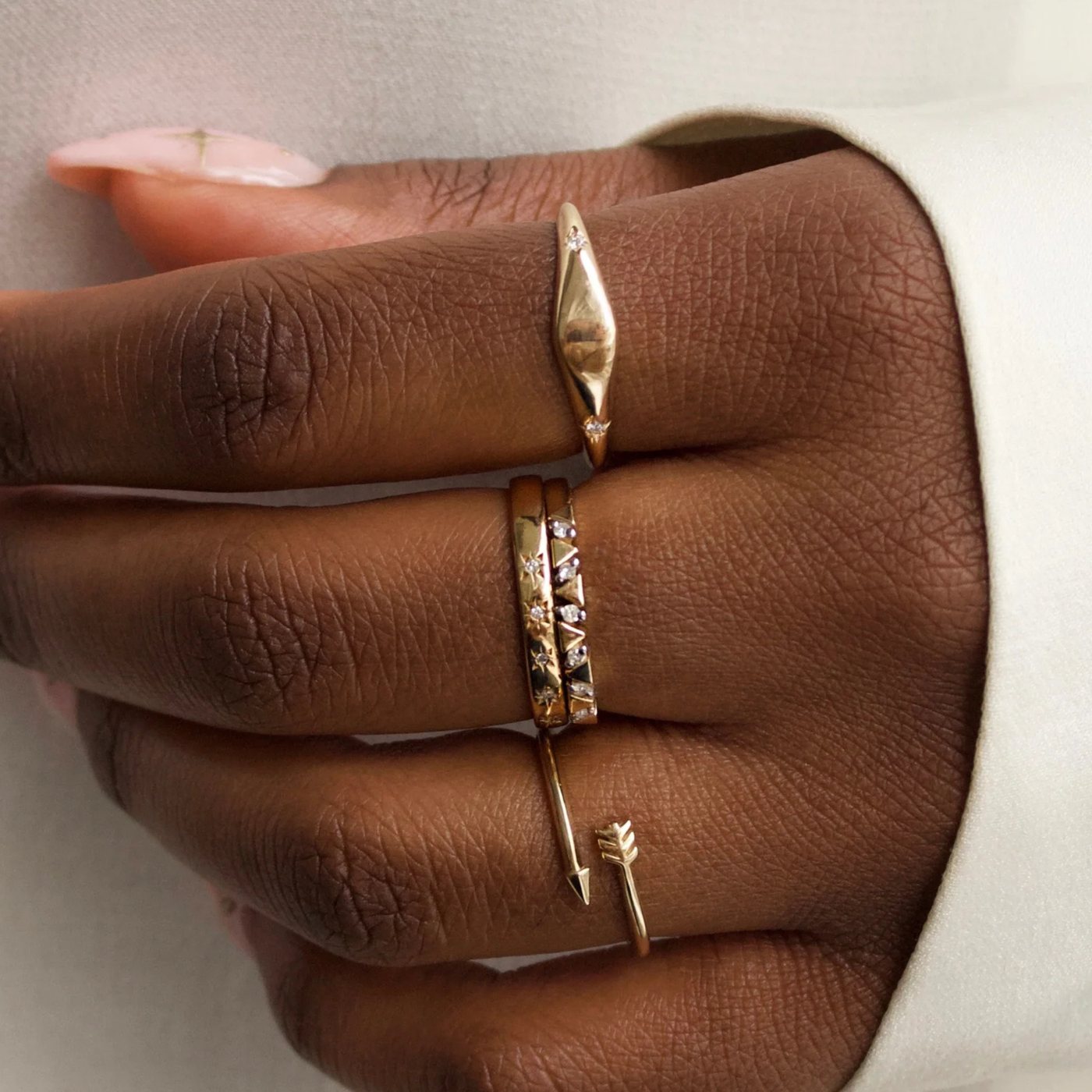 Stacked chevron rings worn on hand